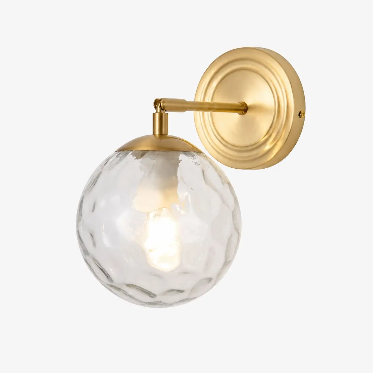 Gold wall lamp with a round rippled glass shade